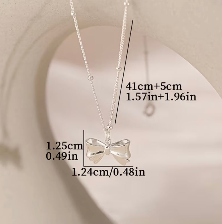 Bow-Knot Pendant Necklace in Silver